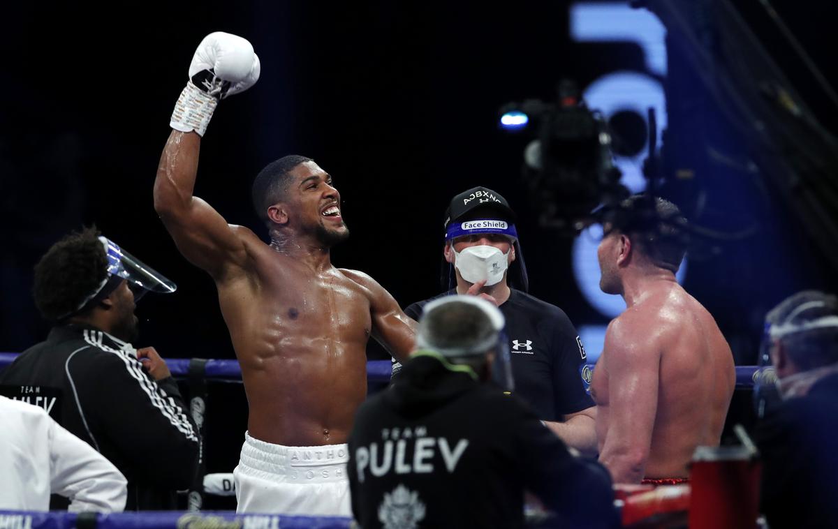 Anthony Joshua, Kubrat Pulev | Anthony Joshua je obdržal naslove WBA, WBO in IBG v težki kategoriji. | Foto Reuters