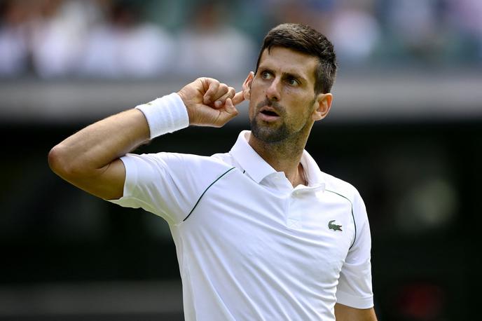 Wimbledon Đoković | Novak Đoković se je dvignil iz pepela in v polfinale napredoval s 3:2 v nizih. | Foto Reuters