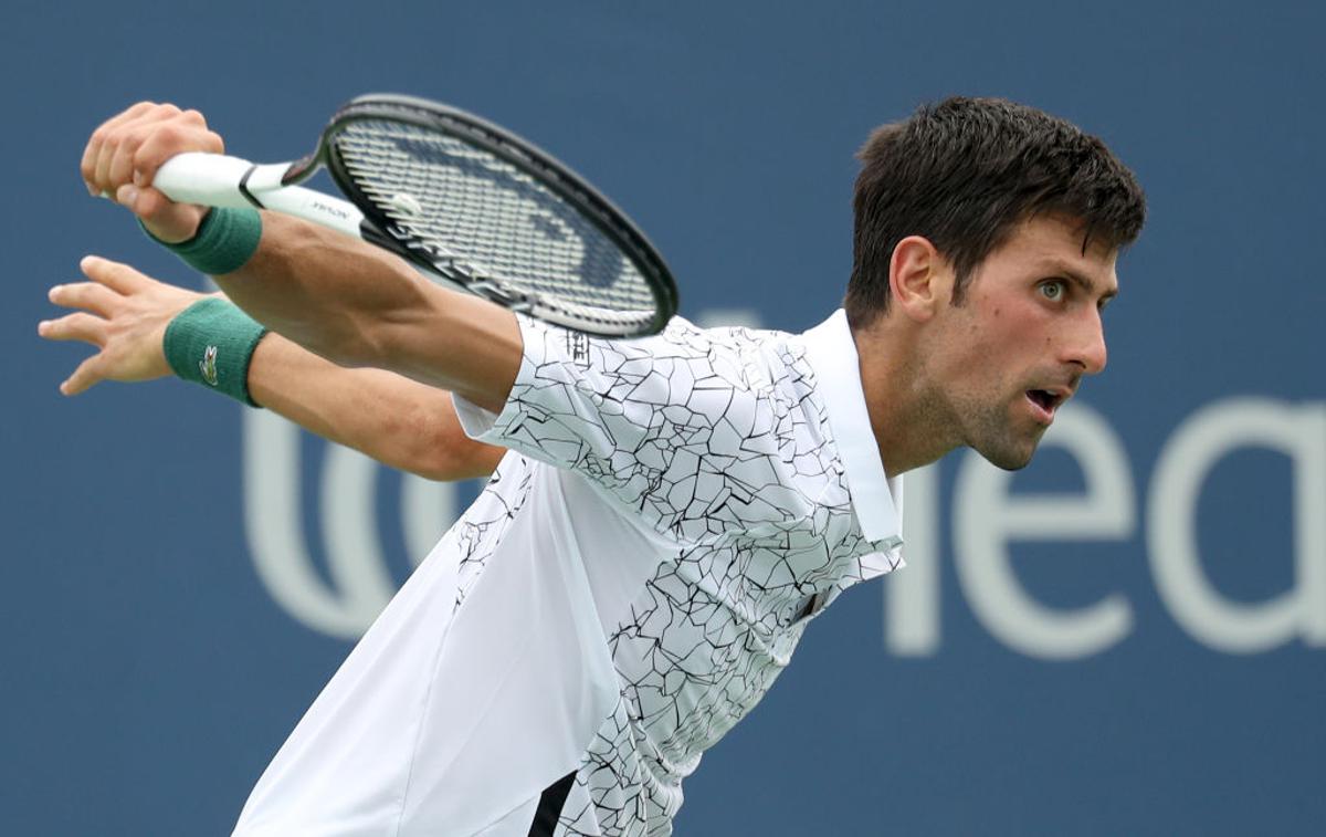 Novak Đoković | Novak Đoković je z 2:1 v nizih izločil Adriana Mannarina. | Foto Guliver/Getty Images