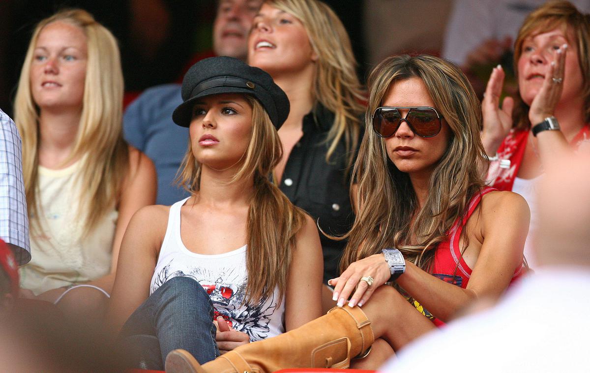 Victoria Beckam, Cheryl Tweedy | Victoria Beckham, žena Davida Beckhama, ki je pod svoje okrilje vzela še Cherly Tweedy, takratno dekle Ashleyja Cola, naj bi bili kolovodji deklet angleških nogometašev, ki so se poleti 2006 prišla zabavat v Nemčijo. | Foto Reuters