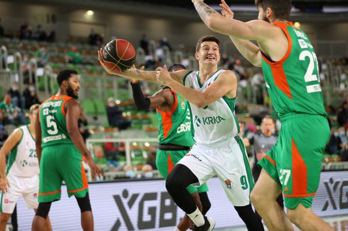 Cedevita Olimpija Krka | Košarkarji Olimpije so novo sezono lige ABA odprli z zmago nad Krko. Po srečanju sta morali obe ekipi v izolacijo. | Foto ABA/Aleš Fevžer