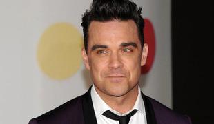 Robbie Williams: Hčerki bom kupil drogo, če bo hotela