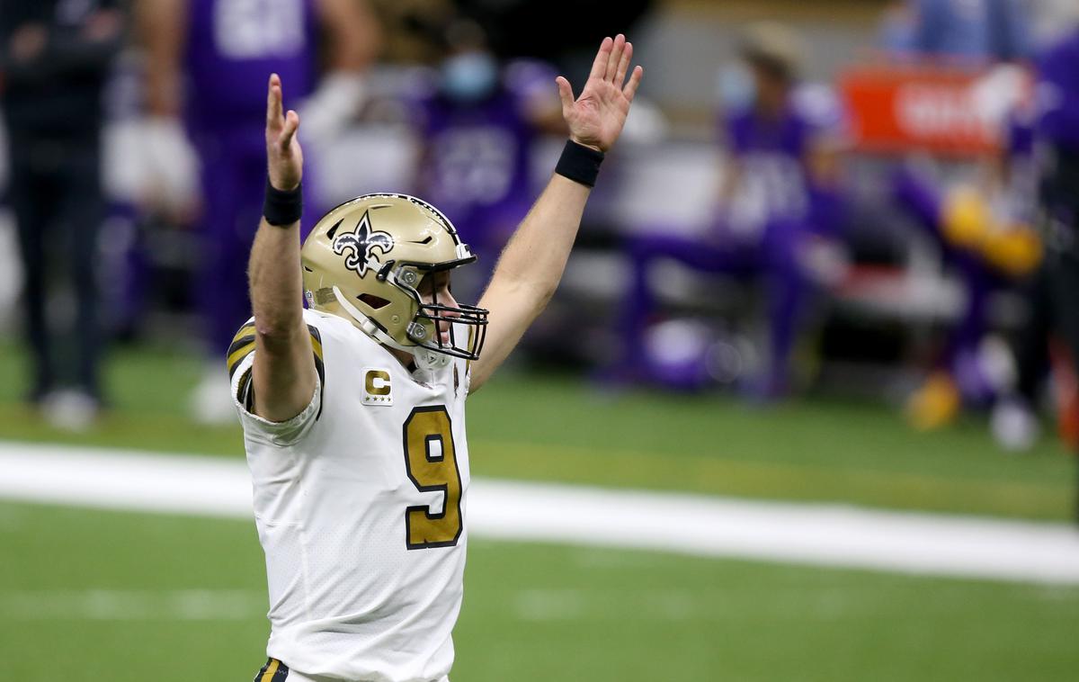 Drew Brees | Drew Brees odhaja v pokoj kot rekorder po osvojenih jardih s  podajami ter ujetih podajah. | Foto Reuters