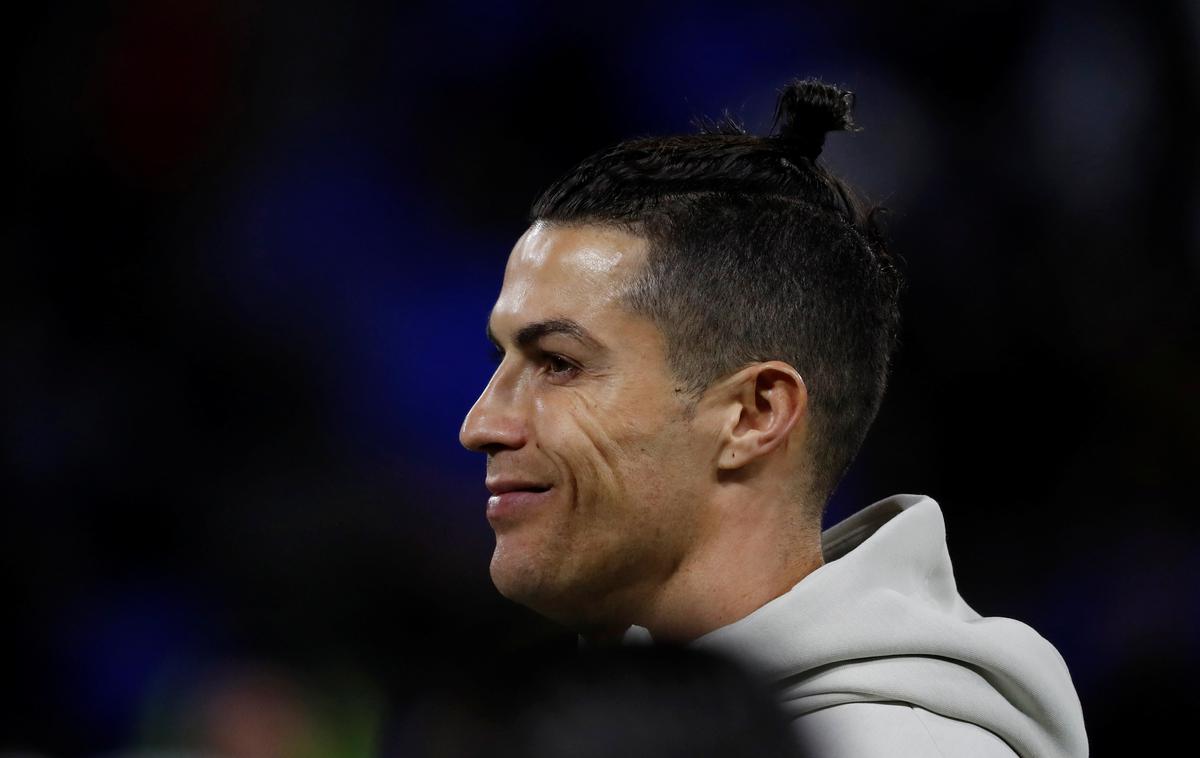 Cristiano Ronaldo | Cristiano Ronaldo je prvič po letu 2018 obiskal Santiago Bernabeu in takoj razburkal domišljijo navijačev Reala. | Foto Reuters