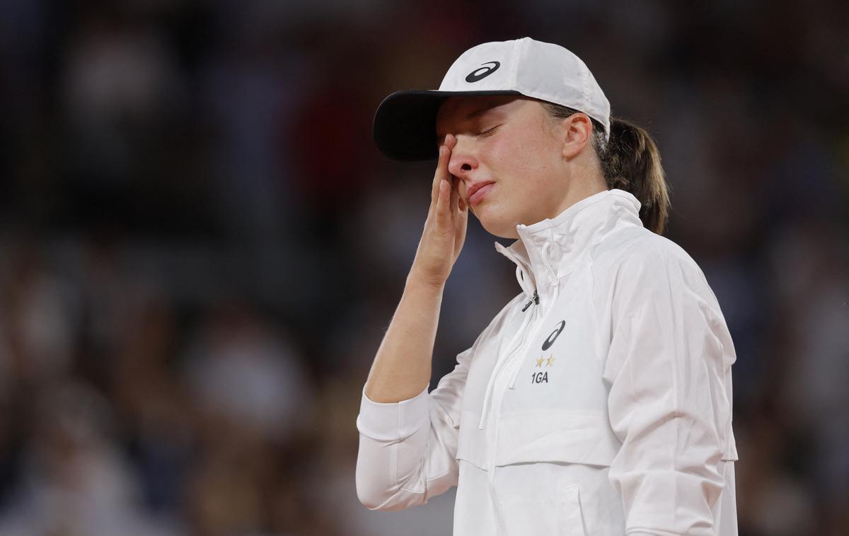 Iga Swiatek finale OP Francije 2022 | Zmagovalka OP Francije se poslavlja z Wimbledona že v 3. krogu. | Foto Reuters