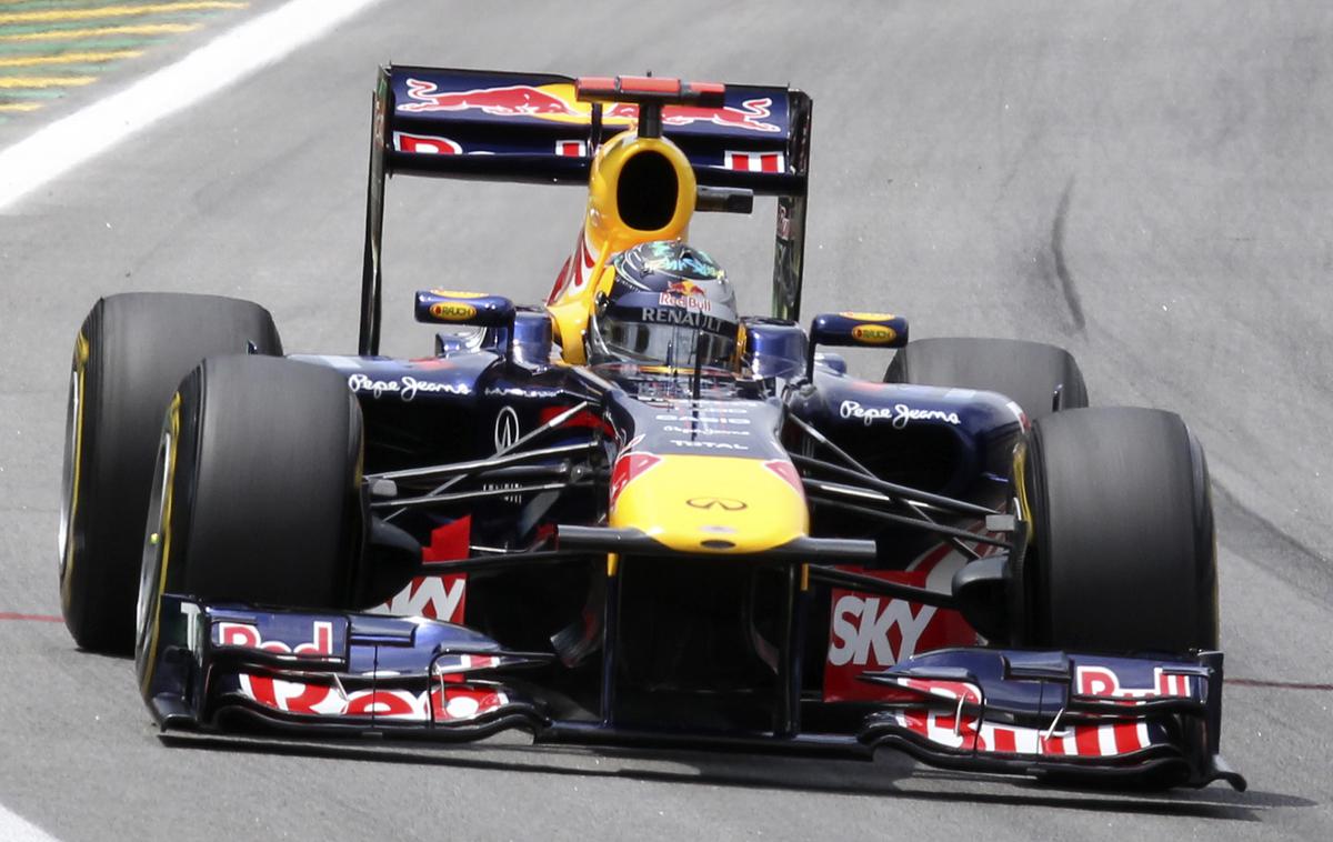 Sebastien Vettel F1 RedBull | Sebastien Vettel je z dirkalnikom RB7 leta 2011 ubranil naslov svetovnega prvaka formule ena. | Foto Reuters