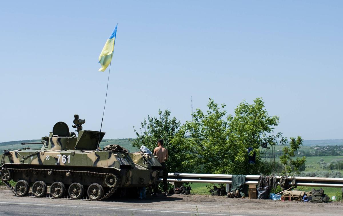 Slovjansk | Na fotografiji iz maja 2014 vidimo ukrajinske vojake, preden so ti iztrgali mesto Slovjansk iz rok proruskih upornikov iz Donecka.  | Foto Guliverimage