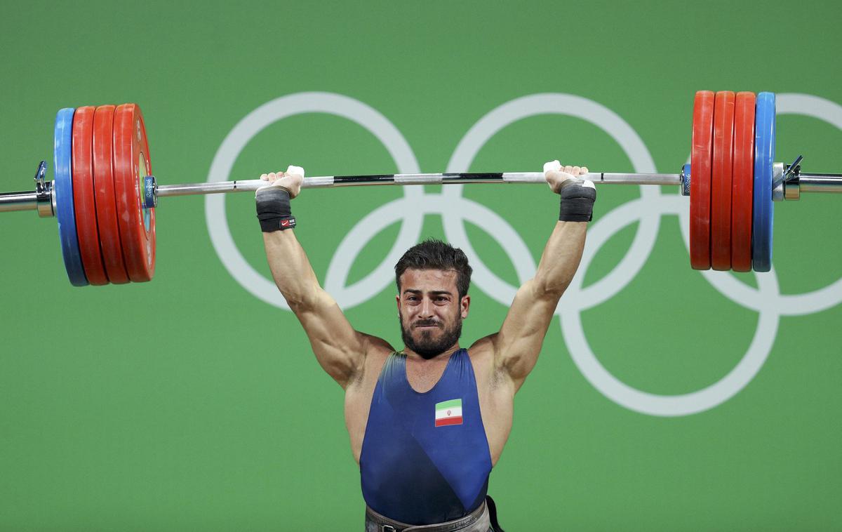 Iran dvigovanje uteži Kianoush Rostami | Dvigovanje uteži ostaja olimpijski šport. | Foto Reuters