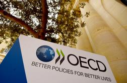 OECD Sloveniji znižal gospodarsko napoved