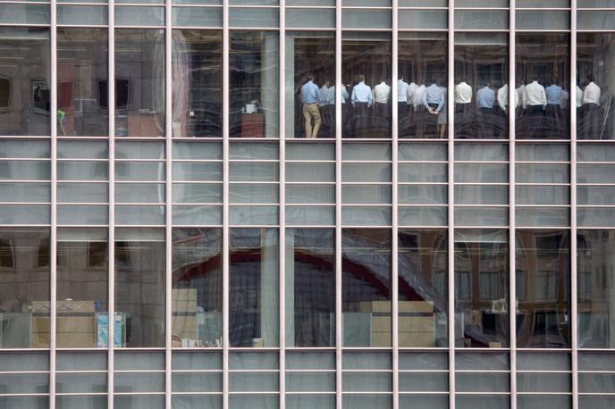 Lehman Brothers | Znamenita fotografija iz leta 2008: krizni sestanek v londonski podružnici Lehman Brothers | Foto Reuters