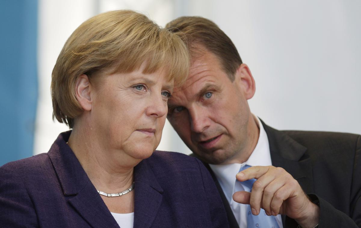 Dieter Althaus (danes Magna Europe) in Angela Merkel | Foto Reuters