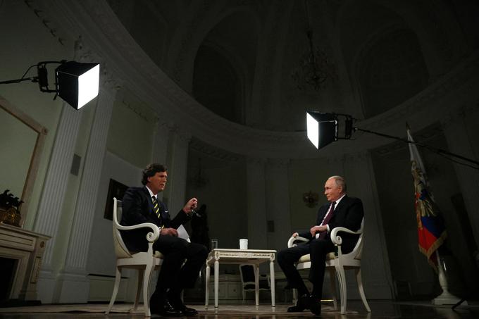 Tucker Carlson, Vladimir Putin, intervju | Foto: Reuters