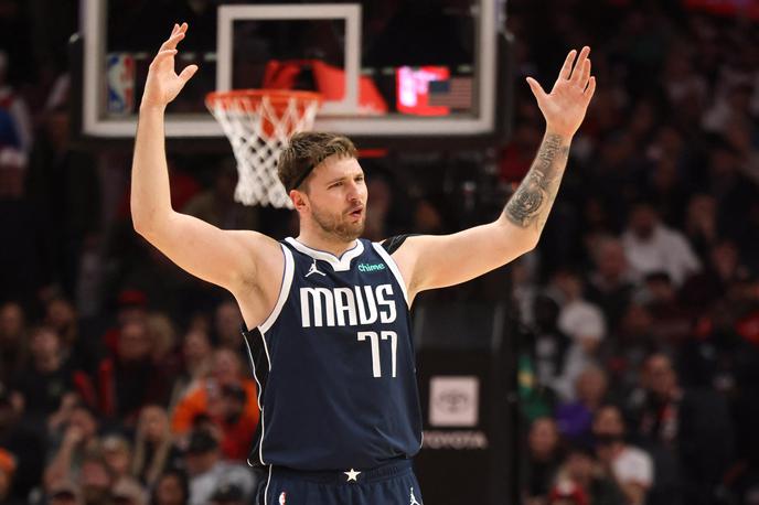 Dallas Mavericks Luka Dončić | Luka Dončić je v Portlandu dosegel trojnega dvojčka: 40 točk, 12 skokov in deset asistenc. | Foto Reuters