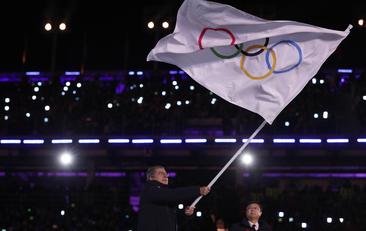 olimpijska zastava | Mok je pozval vse športne zveze k odpovedi ali preselitvi prihajajočih tekmovanj v Rusiji in Belorusiji. | Foto Reuters