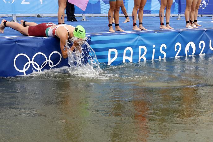 Reka Sena Pariz 2024 | Reko Seno so v ponedeljek ocenili kot dovolj čisto za izvedbo mešane triatlonske štafete po negotovosti glede stopnje onesnaženosti ter bolezni med pripravami in treningi. | Foto Reuters