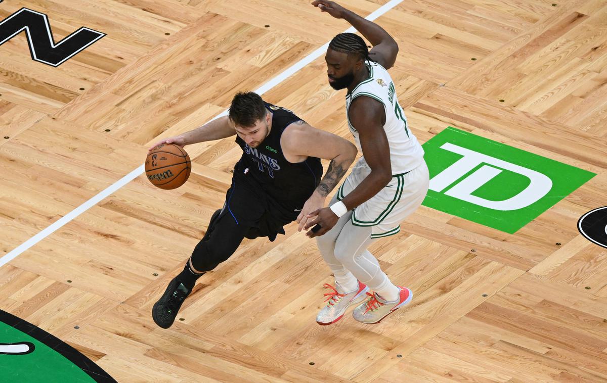 Luka Dončić | Luka Dončić je na uvodni tekmi finala doživel visok poraz. | Foto Reuters