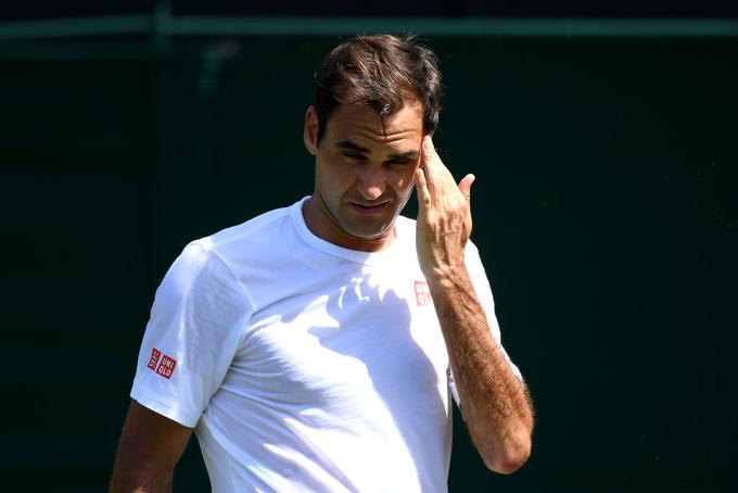 Roger Federer je imel oranžne podplate, kar je bilo proti pravilom. | Foto: Gulliver/Getty Images