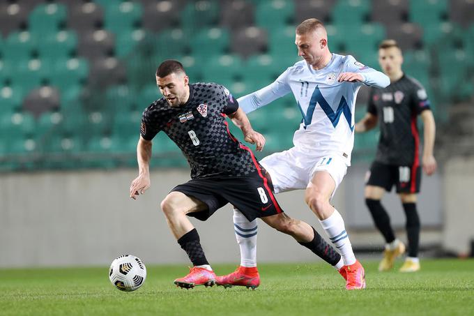 Leta 2021 je sodeloval pri zgodovinski zmagi Slovenije nad takratnim svetovnim podprvakom Hrvaško (1:0). Tako se je boril za žogo z zvezdnikom Manchester Cityja Mateom Kovačićem. | Foto: Aleš Fevžer