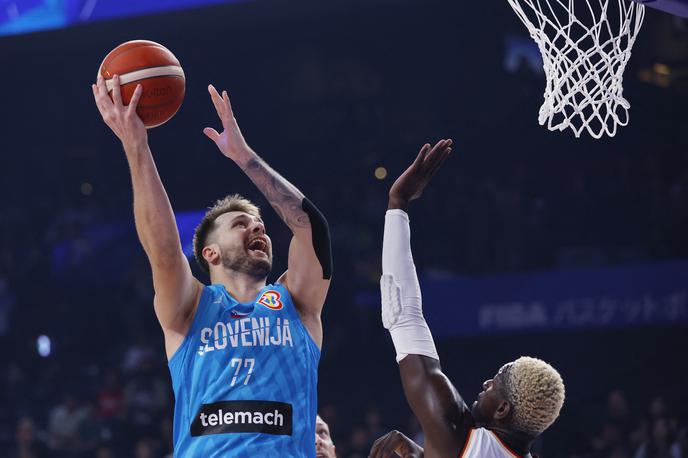 Luka Dončić | Luka Dončić je na dvoboju z Nemčijo malce zaostal za svojim povprečjem (dobrih 26 točk), s katerim je najboljši strelec svetovnega prvenstva. | Foto Reuters