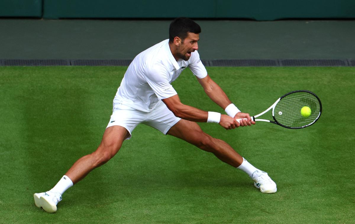 Wimbledon Novak Đoković | Novak Đoković se je v polfinale prebil po štirih nizih. | Foto Reuters