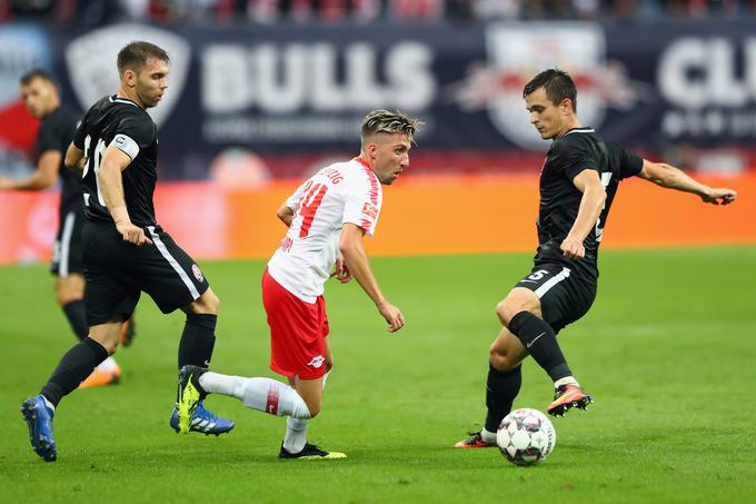 Kevin Kampl je odigral vseh 90 minut za RB Leipzig, ki je pred domačimi navijači napredoval. | Foto: Getty Images