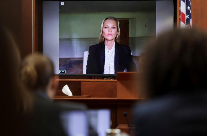 Kate Moss je prek videopovezave pričala iz svojega doma v Veliki Britaniji. | Foto: Reuters