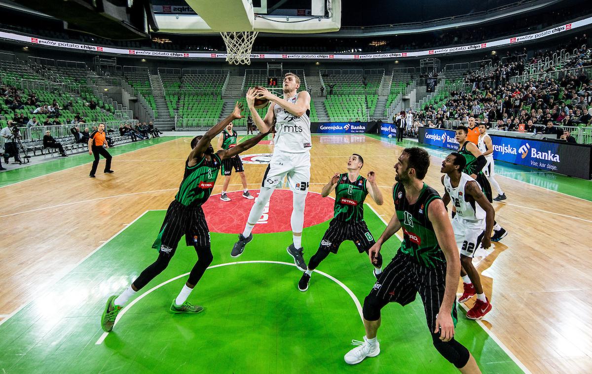 Petrol Olimpija Partizan liga ABA | Košarkarji Petrol Olimpije so se pogumno spopadli s Partizanom, a bili na koncu za nekaj košev prekratki. | Foto Vid Ponikvar