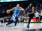 Memphis Grizzlies guard Desmond Bane (22) Dallas Mavericks forward Derrick Jones Jr. (55)