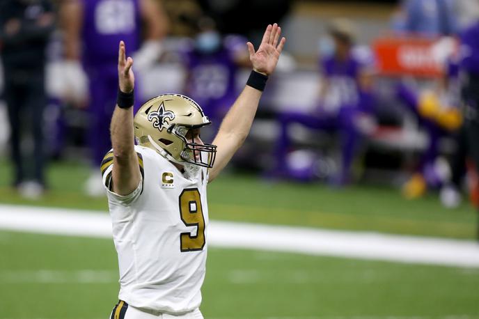 Drew Brees | Drew Brees odhaja v pokoj kot rekorder po osvojenih jardih s  podajami ter ujetih podajah. | Foto Reuters