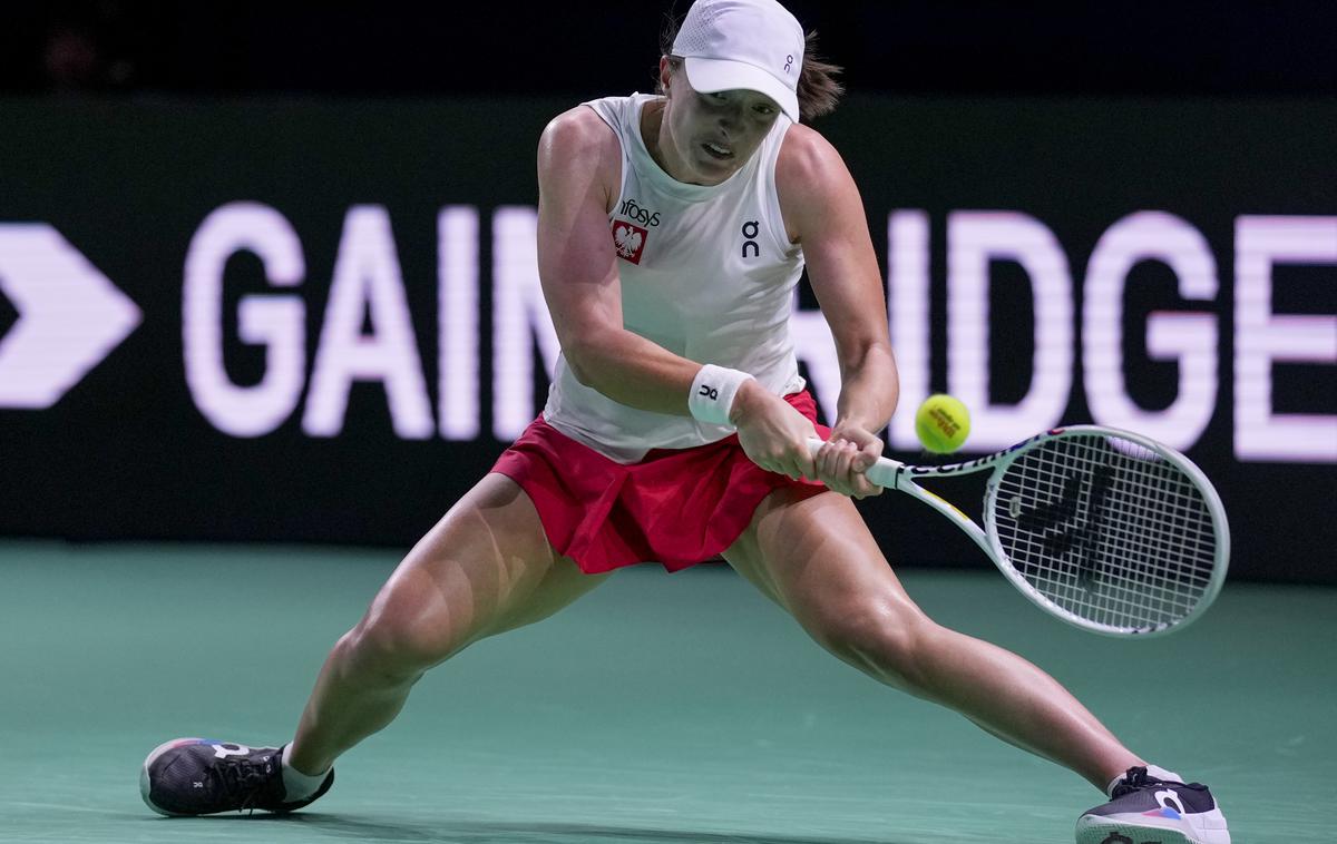 Iga Swiatek | Iga Swiatek je dosegla zaporedni zmagi in Poljsko popeljala v prvi polfinale teniškega pokala Billie Jean King. | Foto Guliverimage