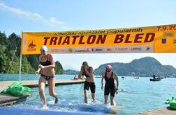 Triatlon Bled: Zmaga je ostala doma, ciciduatlonki pomagal reševalec (foto)