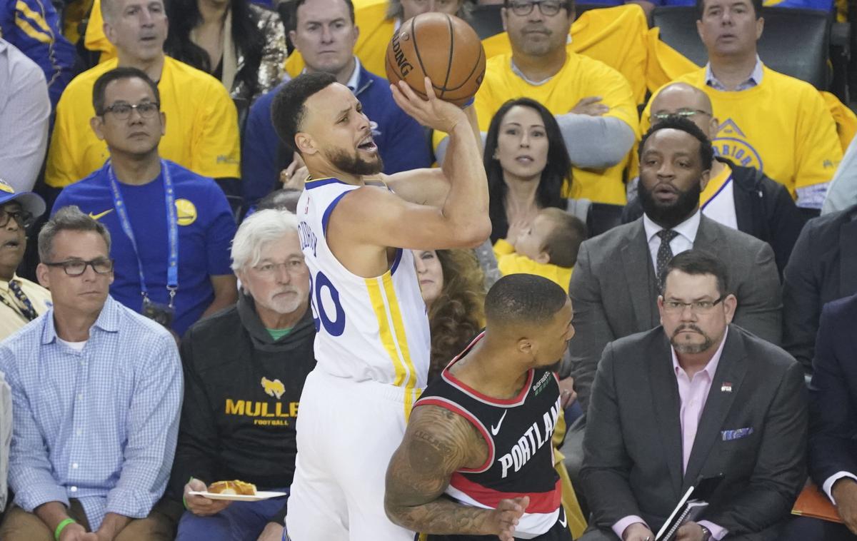 Stephen Curry | Golden State brani naslov prvaka. Stephen Curry je bil na prvi tekmi proti Portlandu s 36 točkami prvi strelec. | Foto Reuters