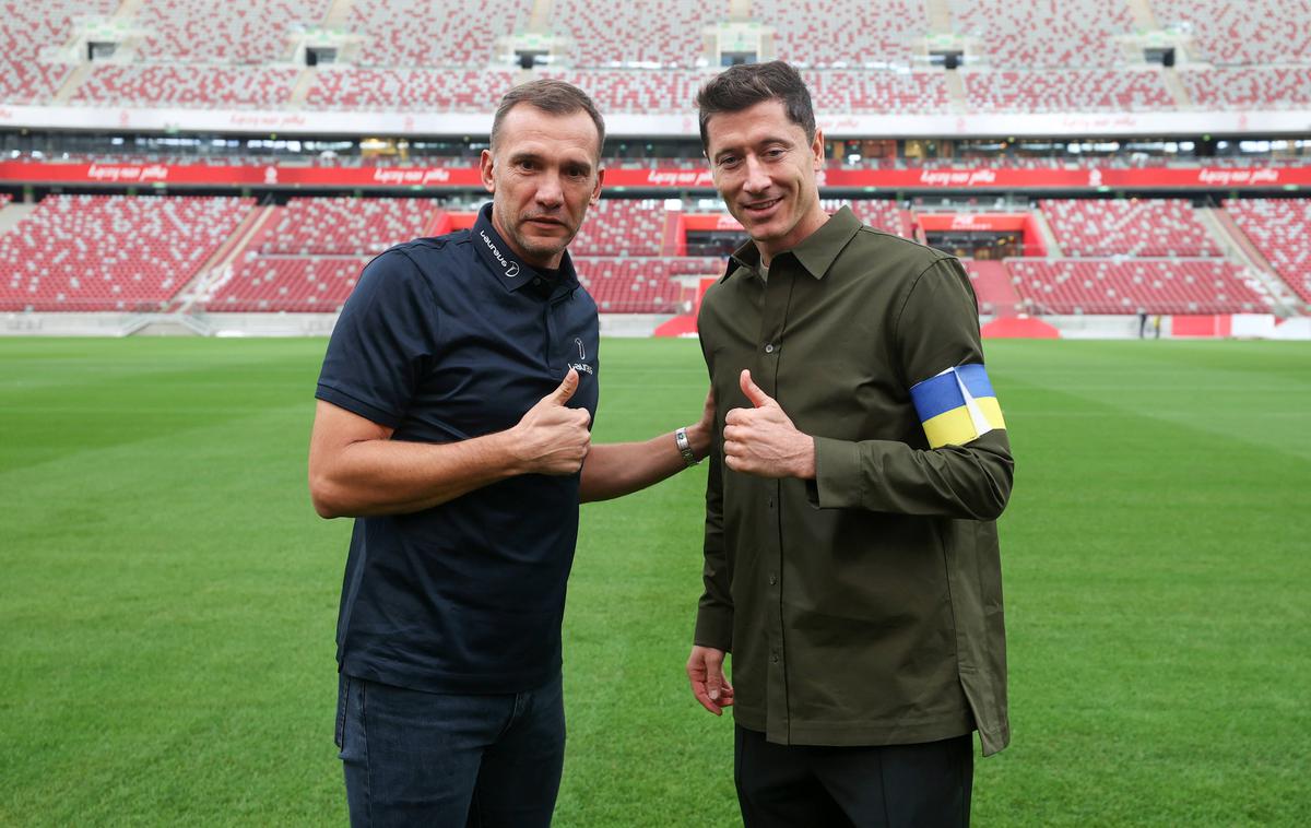 Robert Lewandowski | Poljski napadalec Robert Lewandowski bo na mundialu nosil kapetanski trak v barvah Ukrajine, ki bo simbolno predstavljal Ukrajino. | Foto Guliverimage