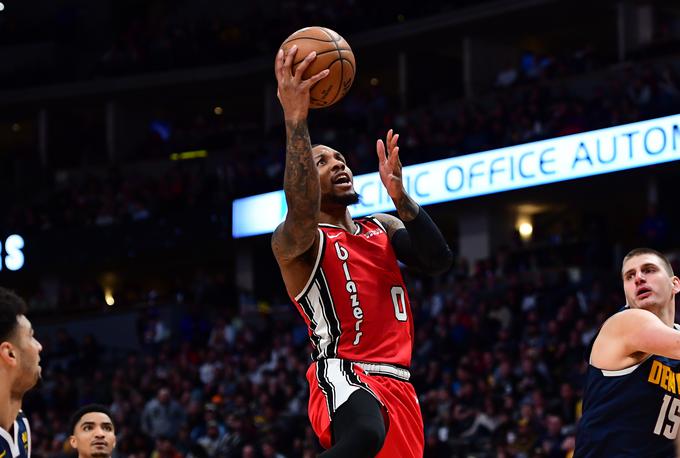 Damian Lillard je prekinil niz srečanj, na katerih je dosegel vsaj 30 točk, Nikola Jokić pa je bil z 29 točkami prvi strelec dvoboja. | Foto: Reuters