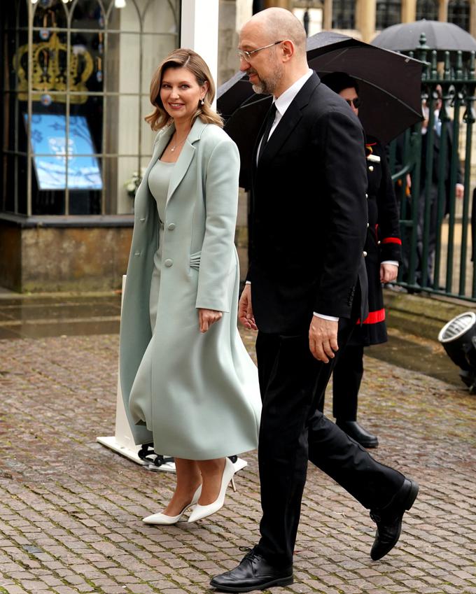 Žena ukrajinskega predsednika Olena Zelenska in ukrajinski premier Denis Šmigal. | Foto: Reuters