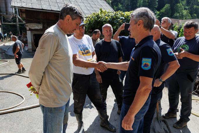 V pomoči prizadetim v poplavah sta koalicija in opozicija državotvorno stopili skupaj. Na sliki premier Robert Golob, njegov predhodnik Janez Janša in bivši predsednik Borut Pahor. | Foto: Nebojša Tejić/STA