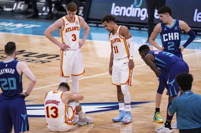 Bogdan Bogdanović | Srbski košarkar Bogdan Bogdanović si je na sobotni tekmi z ekipo Charlotte Hornets hudo poškodoval desno koleno. | Foto Guliverimage/Getty Images