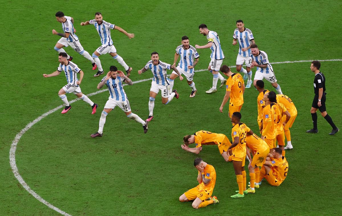 SP četrtfinale Argentina Nizozemska | Argentina je po streljanju enajstmetrovkah znova izločila Nizozemsko. | Foto Reuters