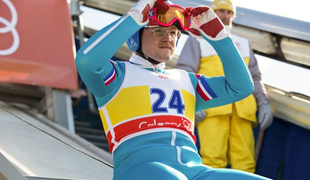 Britanski skakalec Eddie the Eagle je zmagovalec vsaj v kinu