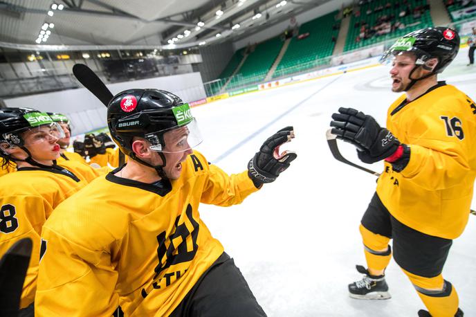 Litva hokej | Hokejisti Litve so odlično izkoristili ponujeno priložnost in na svoji zadnji tekmi svetovnega prvenstva s 5:4 premagali Romunijo ter osvojili tretje mesto. | Foto Domen Jančič/HZS