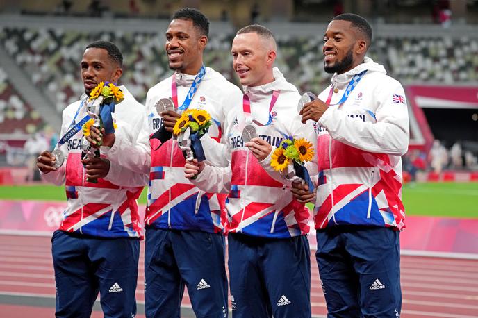 Chijindu Ujah, Zharnel Hughes, Richard Kilty in Nethaneel Mitchell-Blake | Takole so se Chijindu Ujah, Zharnel Hughes, Richard Kilty in Nethaneel Mitchell-Blake veselili srebrnega olimpijskega odličja. Danes so ga morali vrniti. | Foto Reuters