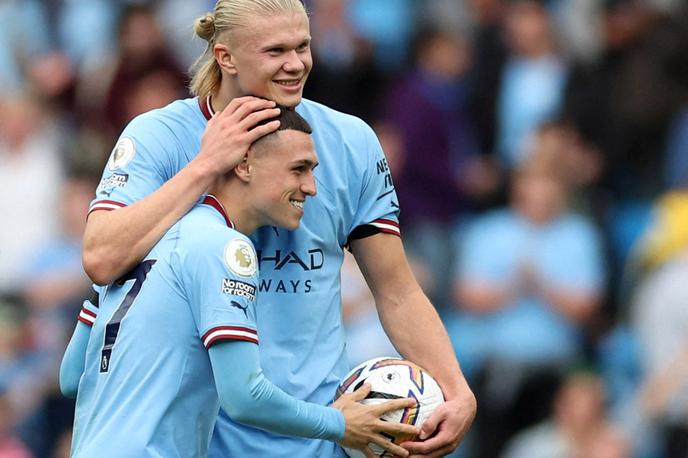 Erling Haaland Phil Foden Manchester City | Erling Haaland in Phil Foden sta se podpisala pod hat-trick. | Foto Reuters