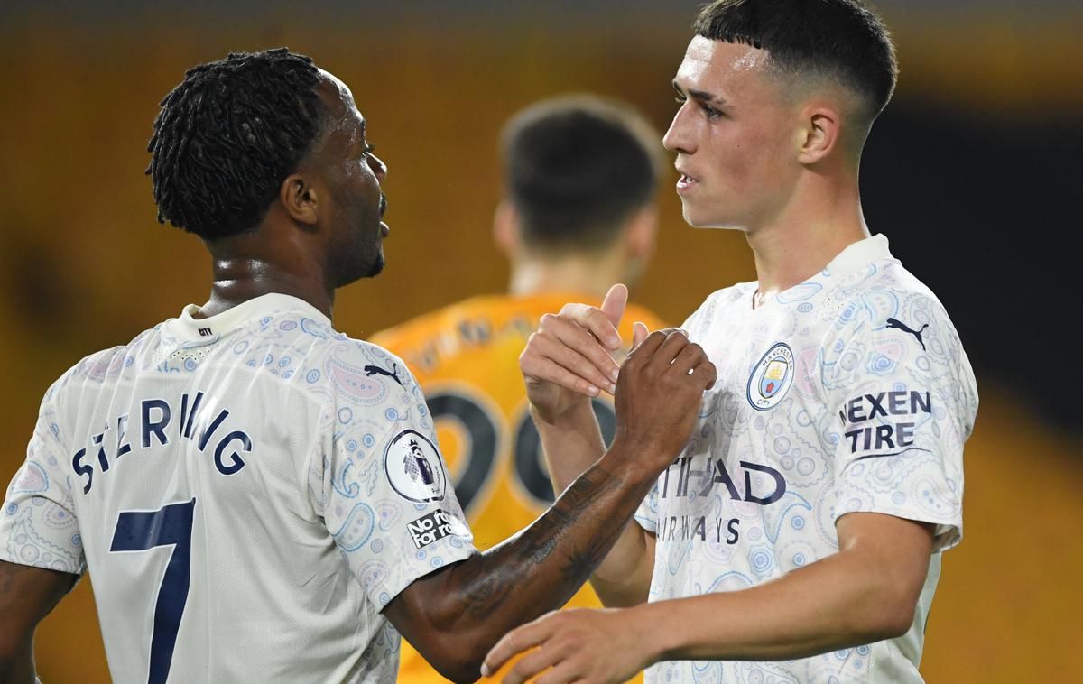 Manchester City | Phil Foden in Raheem Sterling proslavljata enega od treh golov Manchester Cityja. | Foto Reuters