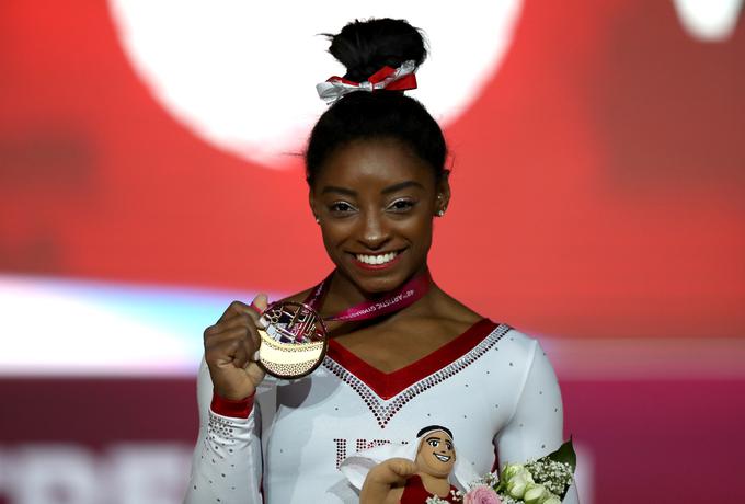 Simon Biles si je naziv športnice leta po izboru fundacije Women's Sports Foundation priborila leta 2014. | Foto: Getty Images