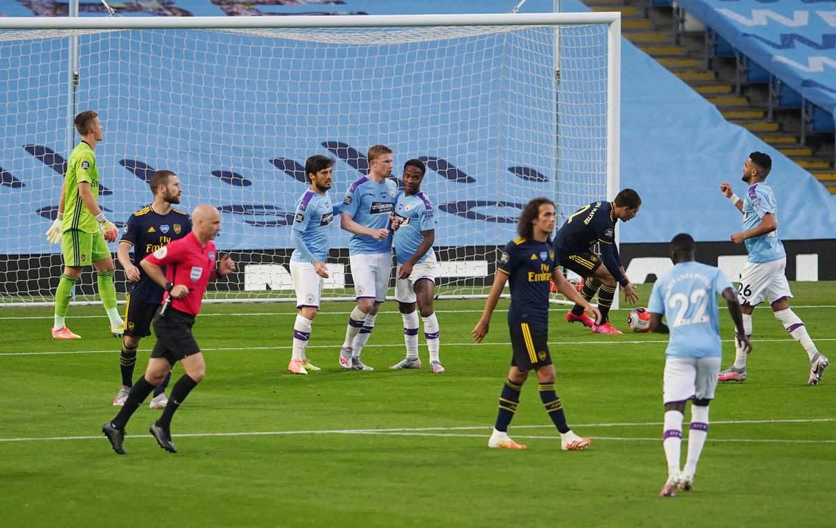 manchester City Arsenal | Manchester City je na prvem obračunu po koronapremoru s 3:0 premagal Arsenal. | Foto Reuters