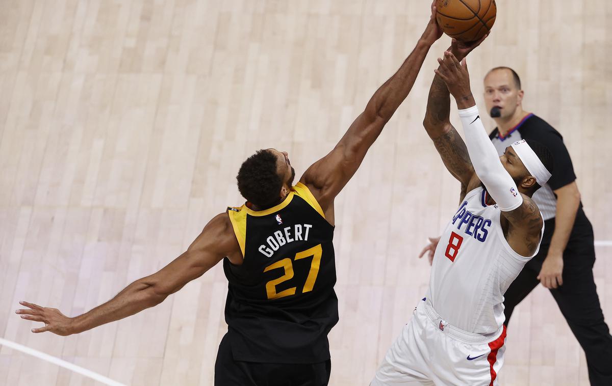 Rudy Gobert | Francoski center Rudy Gobert je z blokado v zadnji sekundi preprečil, da bi Marcus Morris izsilil podaljšek. | Foto Reuters