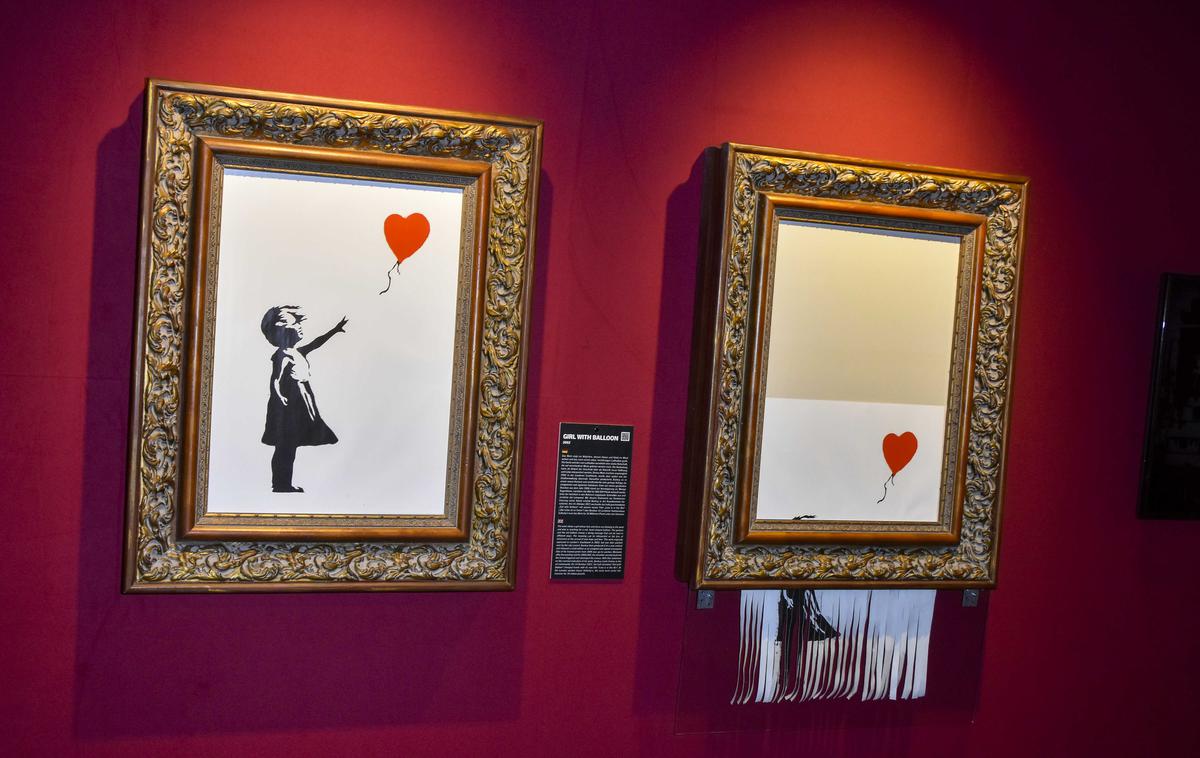 Banksy | Med njegovimi najbolj kultnimi deli je Deklica z balonom. | Foto Guliverimage