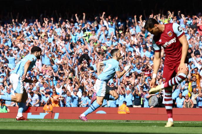 Phil Foden | Branilce naslova je Phil Foden, najboljši igralec prvenstva, popeljal v vodstvo proti West Hamu že v 2. minuti. V 18. minuti je povišal rezultat na 2:0, na koncu pa so gostitelji zmagali s 3:1. | Foto Reuters