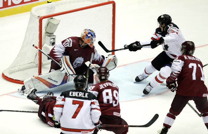 Kanadčani so Latvijo premagali šele v podaljšku in si zagotovili četrtfinale. | Foto: Reuters