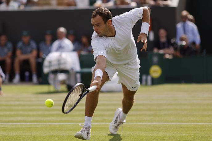 Roman Safjulin | Roman Safjulin je prvi četrtfinalist Wimbledona. | Foto Reuters